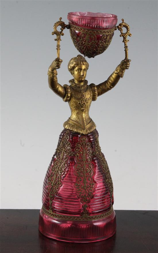 A German ruby glass and gilt metal figural marriage cup, probably Fritz Heckert, late 19th century, 26.5cm